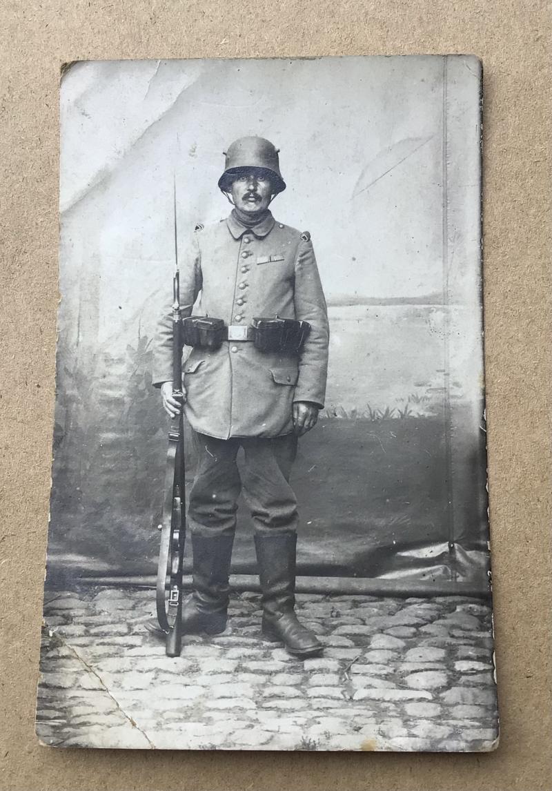 German WW1 Photo Postcard- Veteran Soldier with Helmet and Rifle