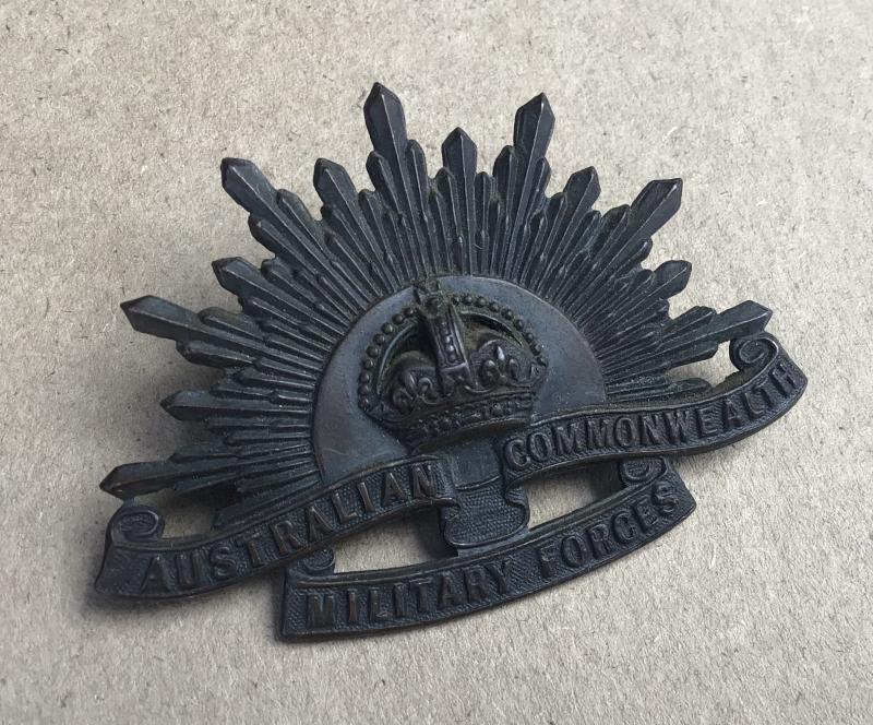 Pre WW2 Rising Sun Hat Badge.
