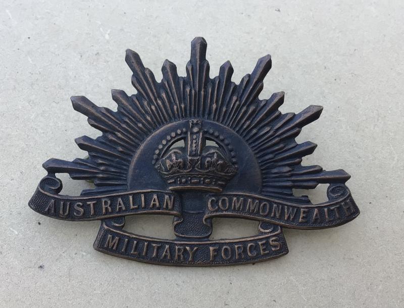 Australia 1930's - WW2 Rising Hat Badge.
