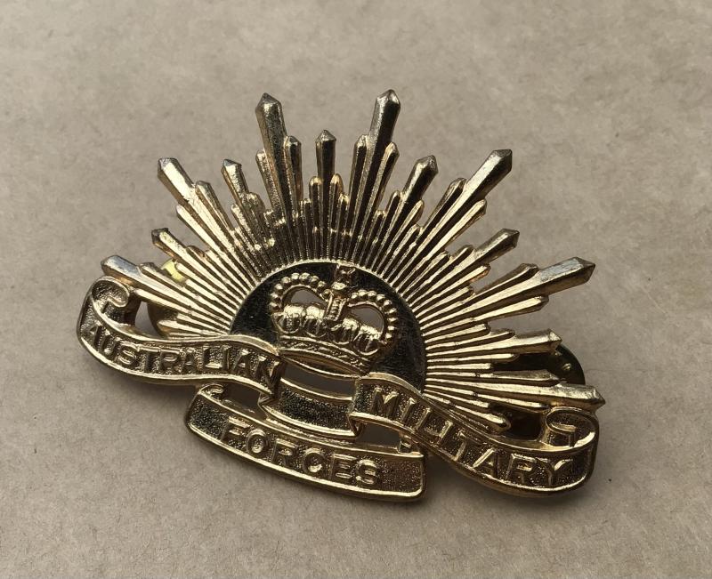 1953-60 Rising Sun Hat Badge.